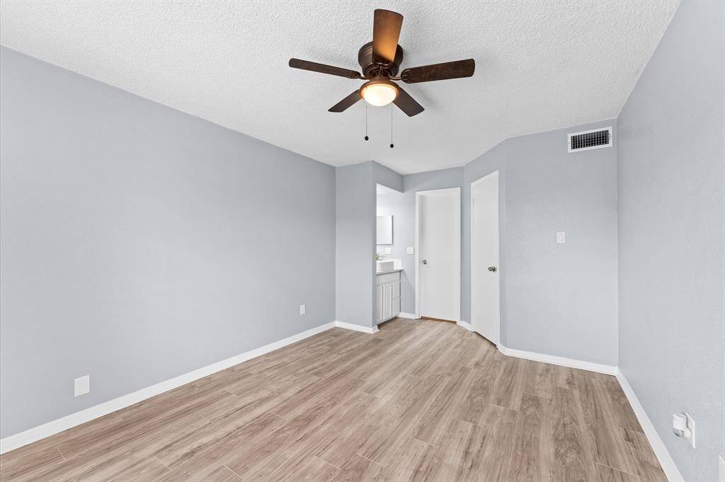 Alternate view of primary looking toward the ensuite bath.