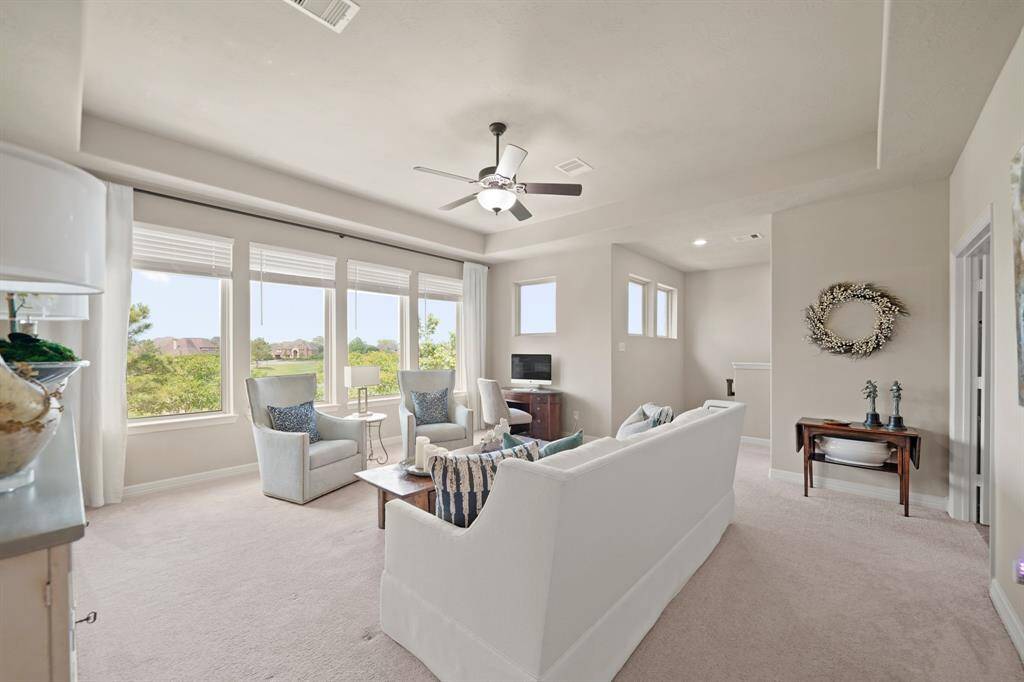 A hidden entry off of the game room leads to the walk-in attic which has been updated to offer an incredible space for additional storage.