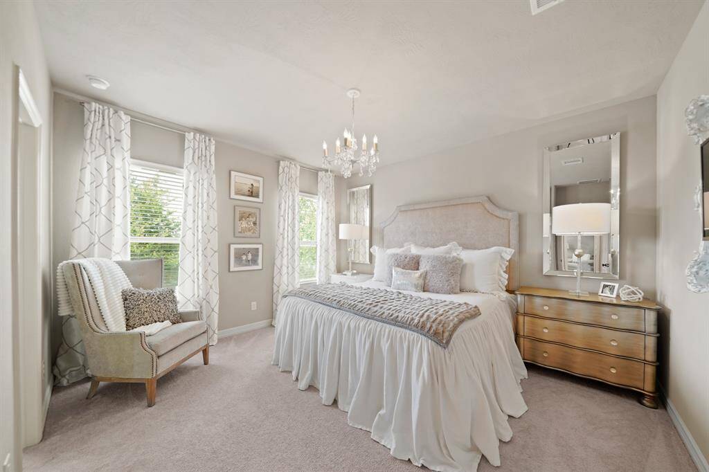 One of 2 upstairs bedrooms.  All bedrooms in this home feature king size beds.