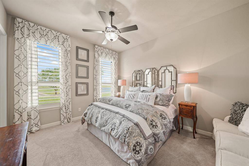 This spacious first floor bedroom affords space for a king sized bed and sitting area.  A private ensuite full bath and walk in closet are included.