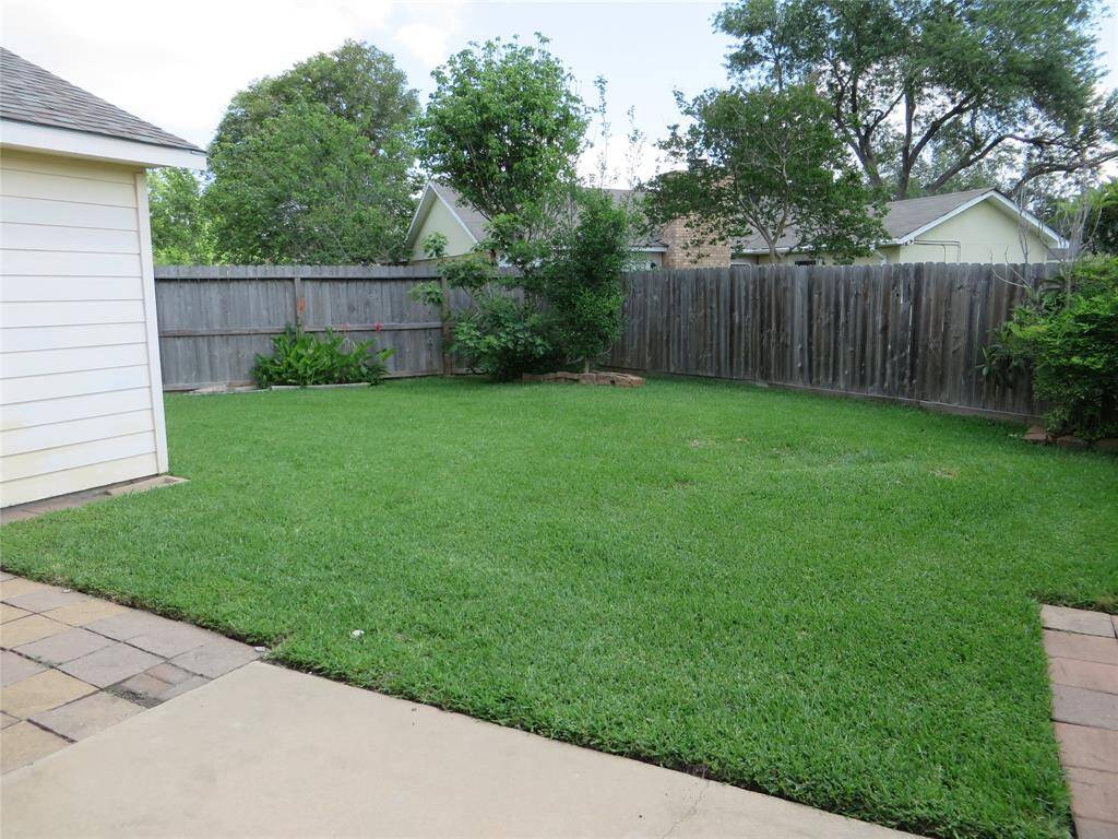 There is a nice, fenced back yard with patio.