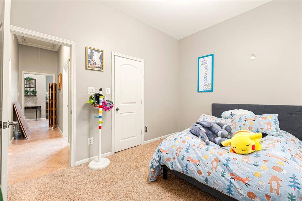 Charming details and a versatile layout make this bedroom perfect for a variety of uses.