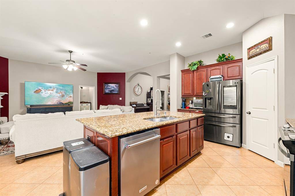 Connected living and dining spaces create an effortless flow ideal for both daily living and entertaining.