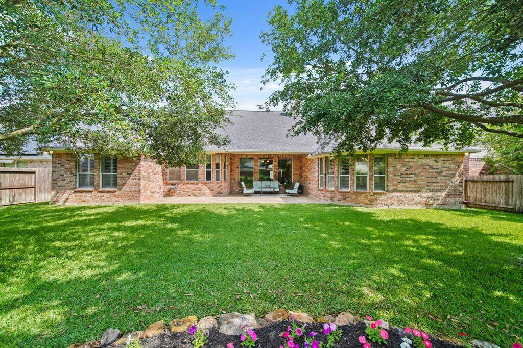 Expansive backyard perfect for family activities and outdoor enjoyment.