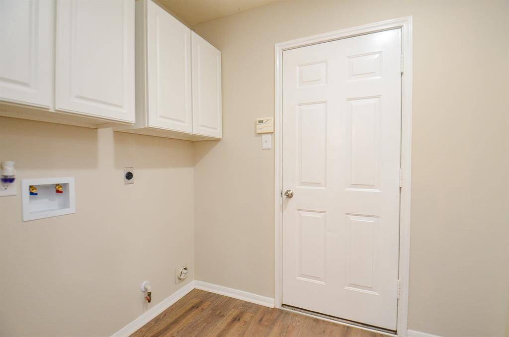 Here you see a view of the utility space just off the breakfast room.