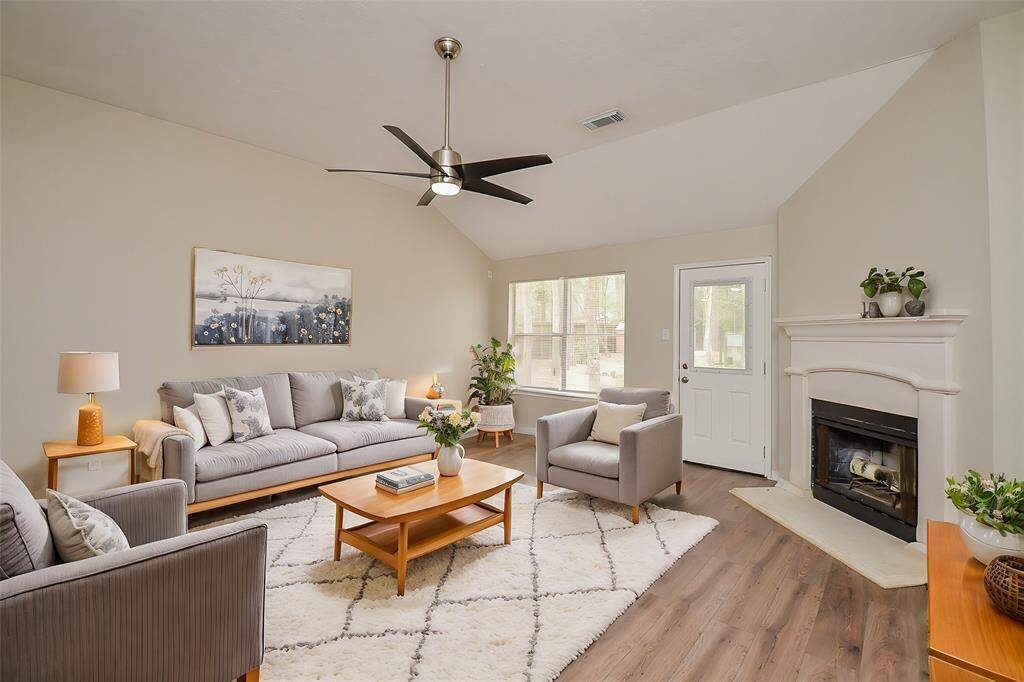 The family room seamlessly connects to the entry, dining room, and kitchen, creating an open floor plan that’s perfect for entertaining.