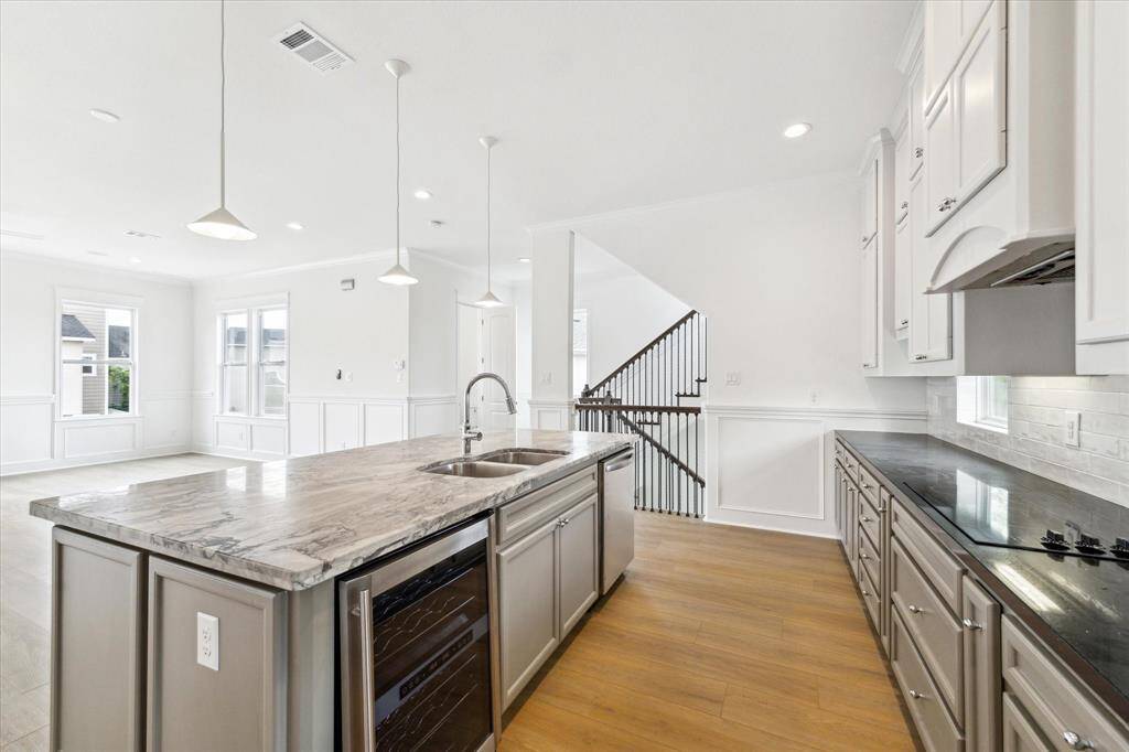 Gorgeous countertops, new lighting, and all new appliances (including wine cooler)!
