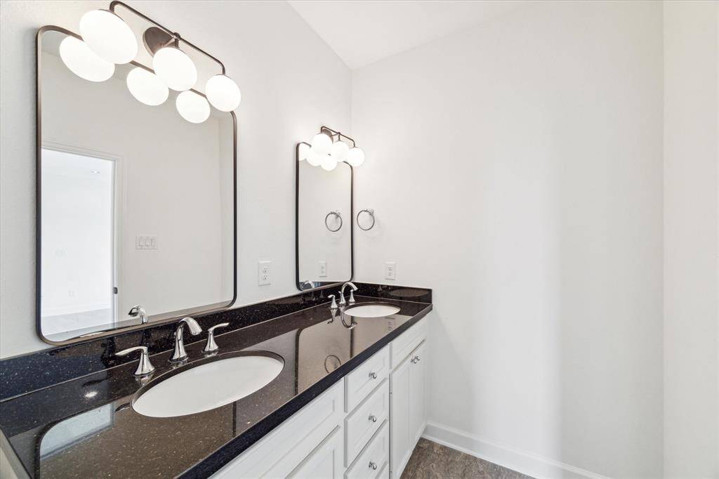 Double vanity and stylish finishes in the primary bath!