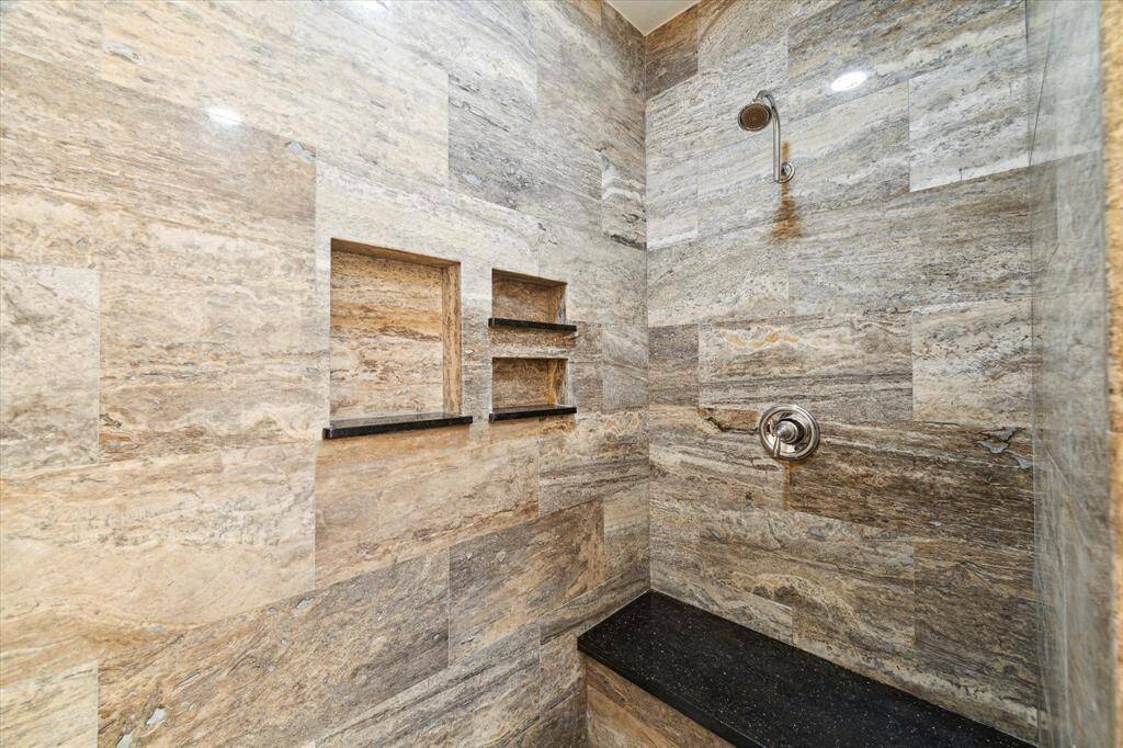 Lovely tile-work in the primary shower.