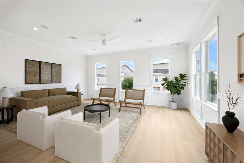 Tons of sunlight streaming into the main living area! (digitally-staged)