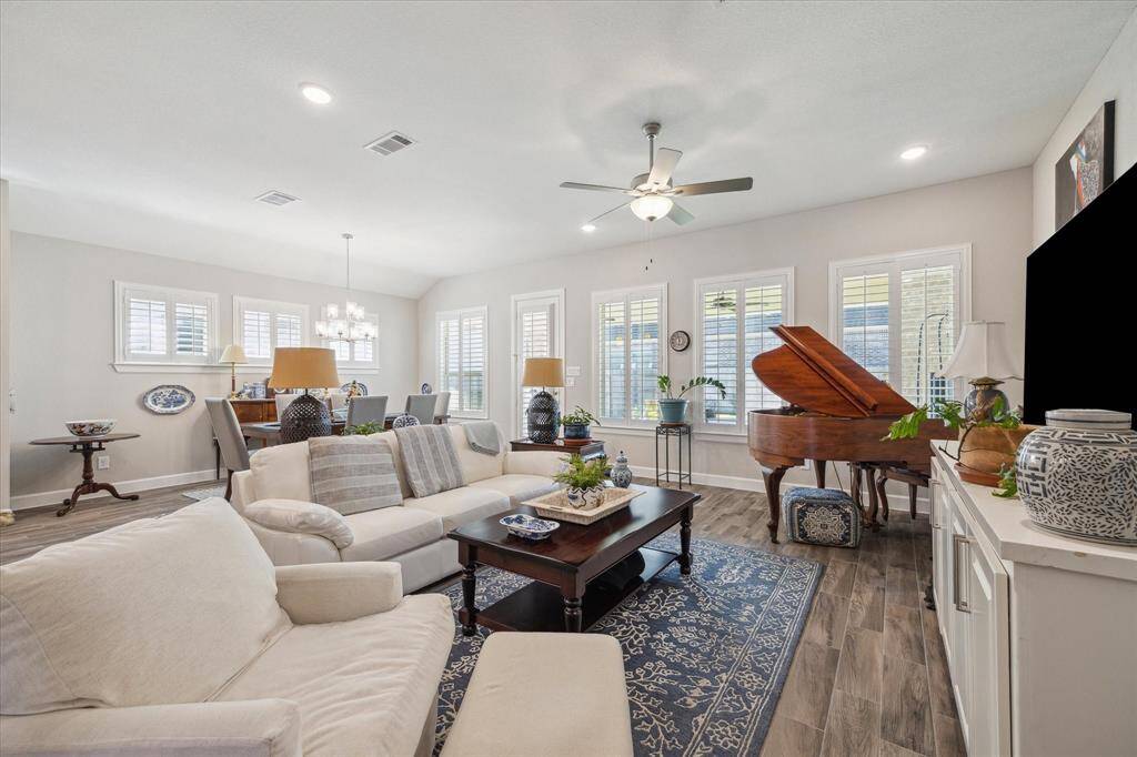 Seamlessly designed, the combined living and dining spaces provide the perfect layout for entertaining or relaxing with loved ones.