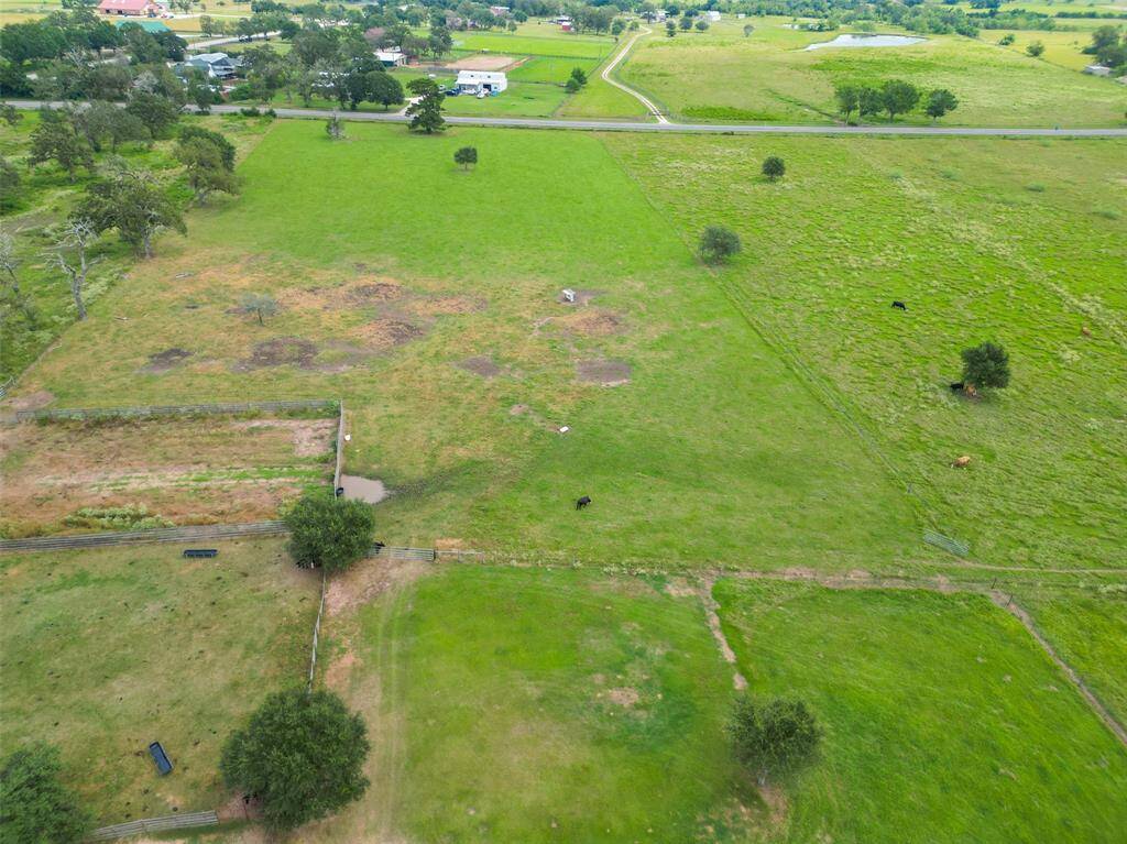 Expansive cross-fenced pastures provide ample room for rotational grazing. Property offers clear boundaries and great visibility from the main road for added convenience.