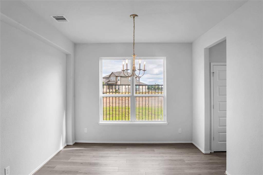 The Princeton- Formal Dining Room. Home under construction. Sample floor plan photo used for illustrative purposes only. Upgrades, selections options, windows and colors may vary.