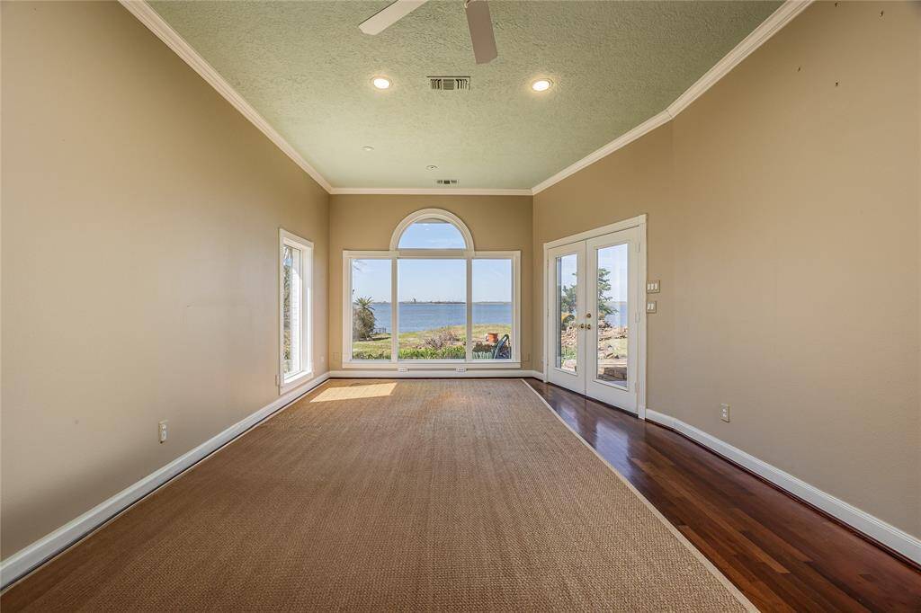 Primary bedroom- French doors to patio and sitting area