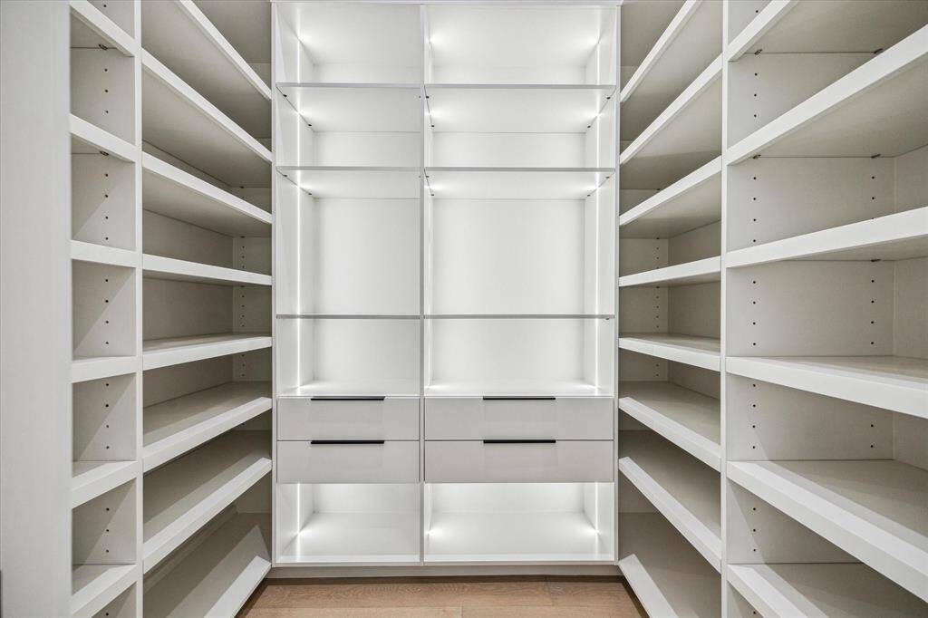 The food pantry is a nicely planned 6x8 walk-in with special lighting.