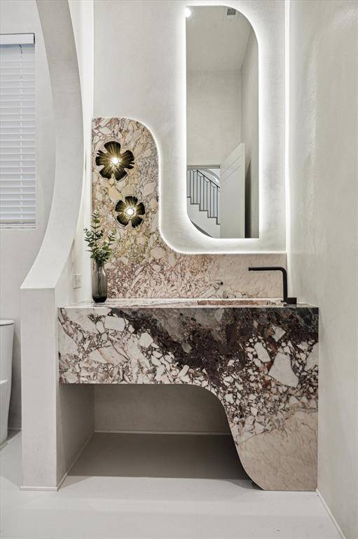 The Powder Bath has an intriguing design in French marble.