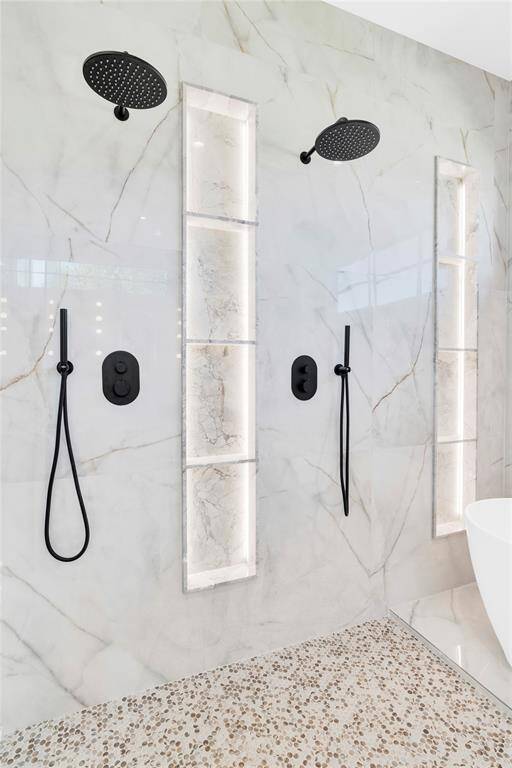 It has two columns of built-in and illuminated wet area storage.