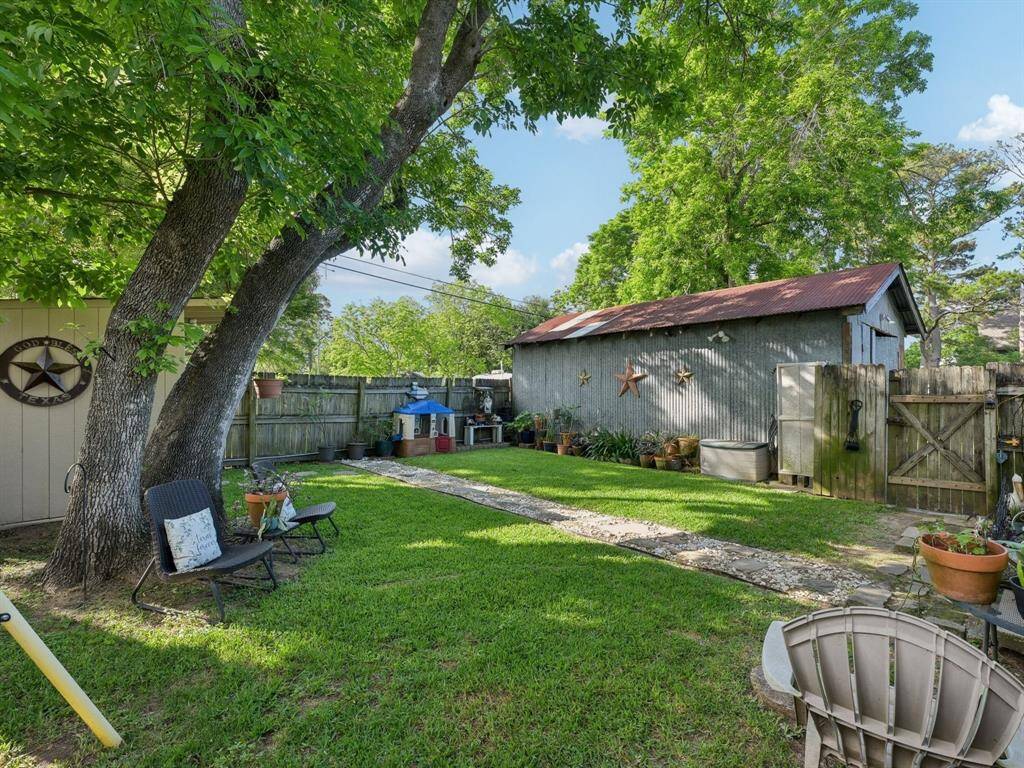 Just beyond the fence is the additional lot that is being sold with the house. Extend the fence and let the good times roll!