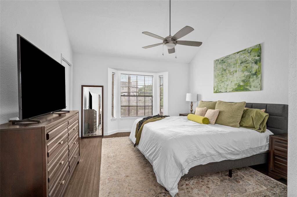 First floor primary suite with walk-in closet.