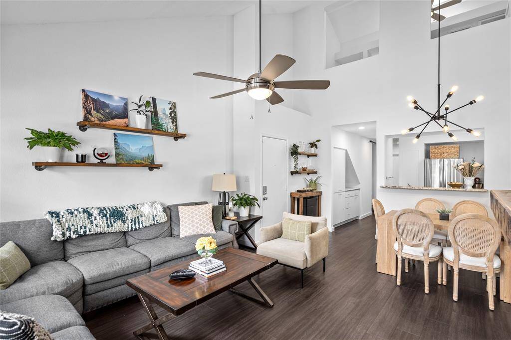 Open-concept living with high ceilings.