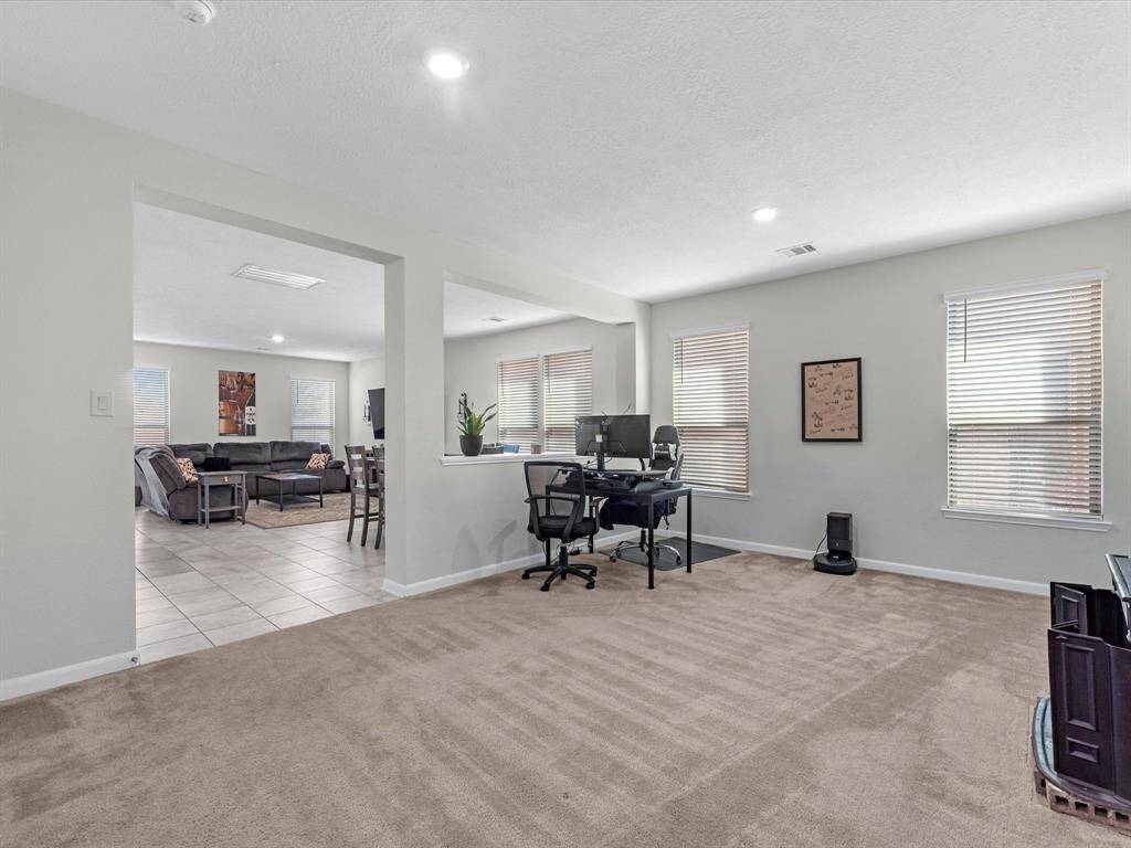Formal living area, offering a versatile space for whatever your needs might be