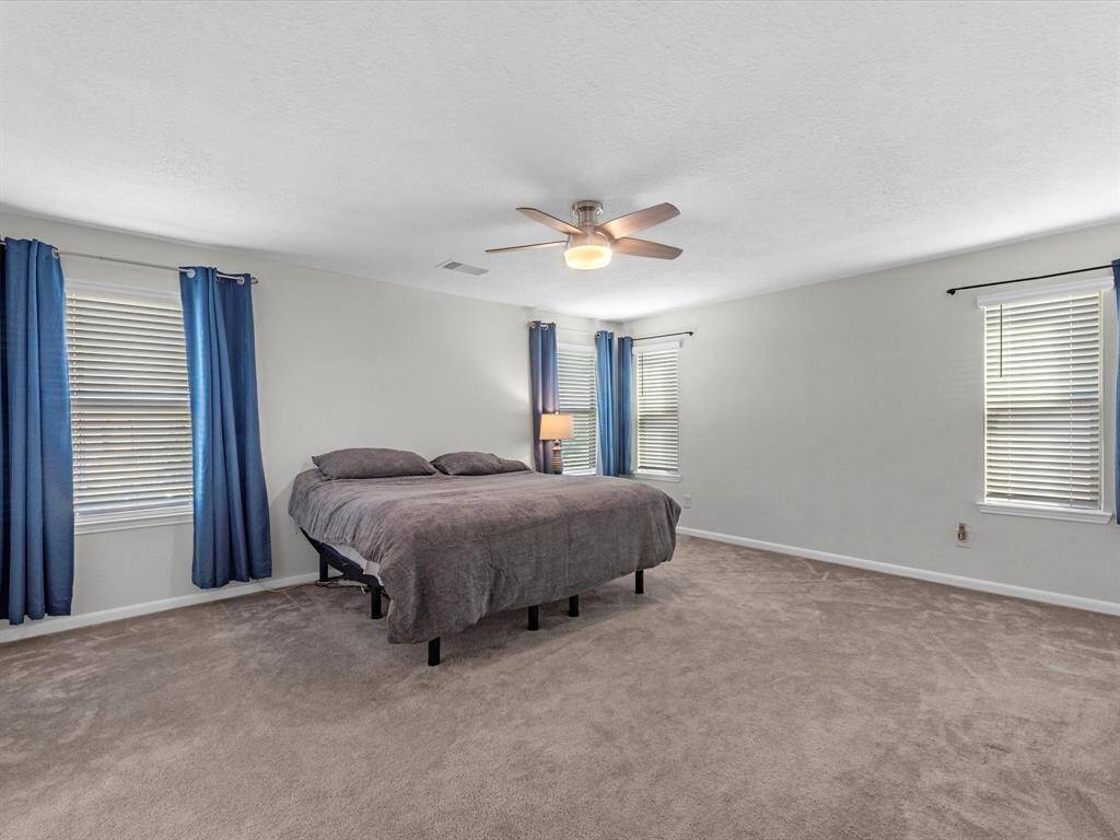 Expansive primary bedroom suite! Upstairs