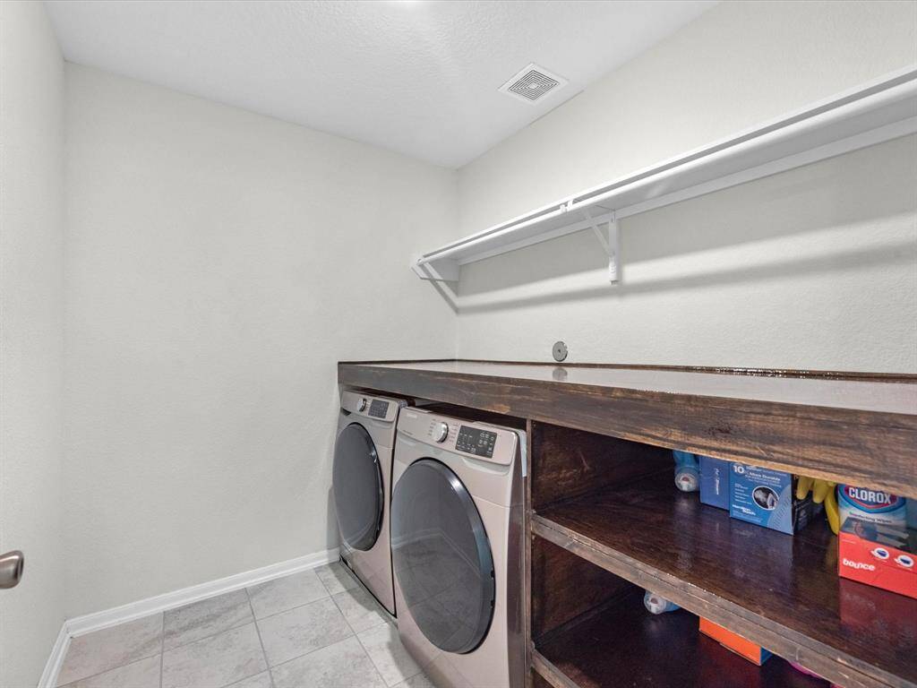 Laundry with custom built-in folding table, upstairs