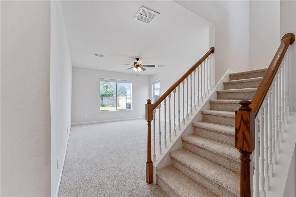 Primary bedroom with second staircase