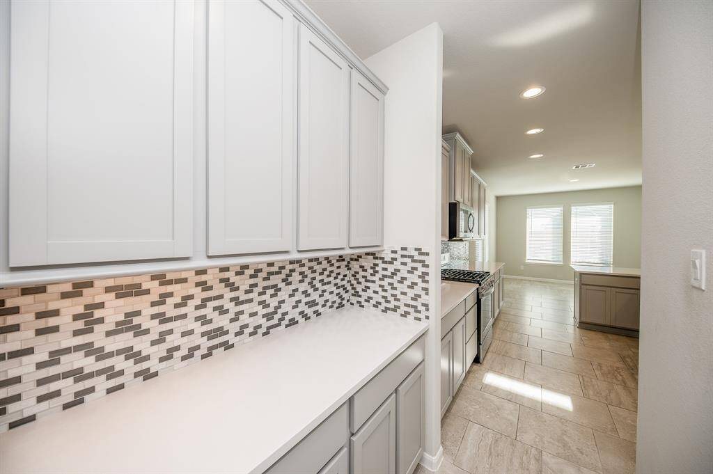 It also comes equipped with a butlers pantry, which is perfect for a coffee bar set up.