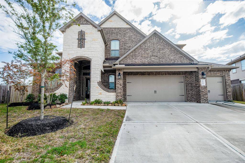 This home comes with a wide 3 car garage.