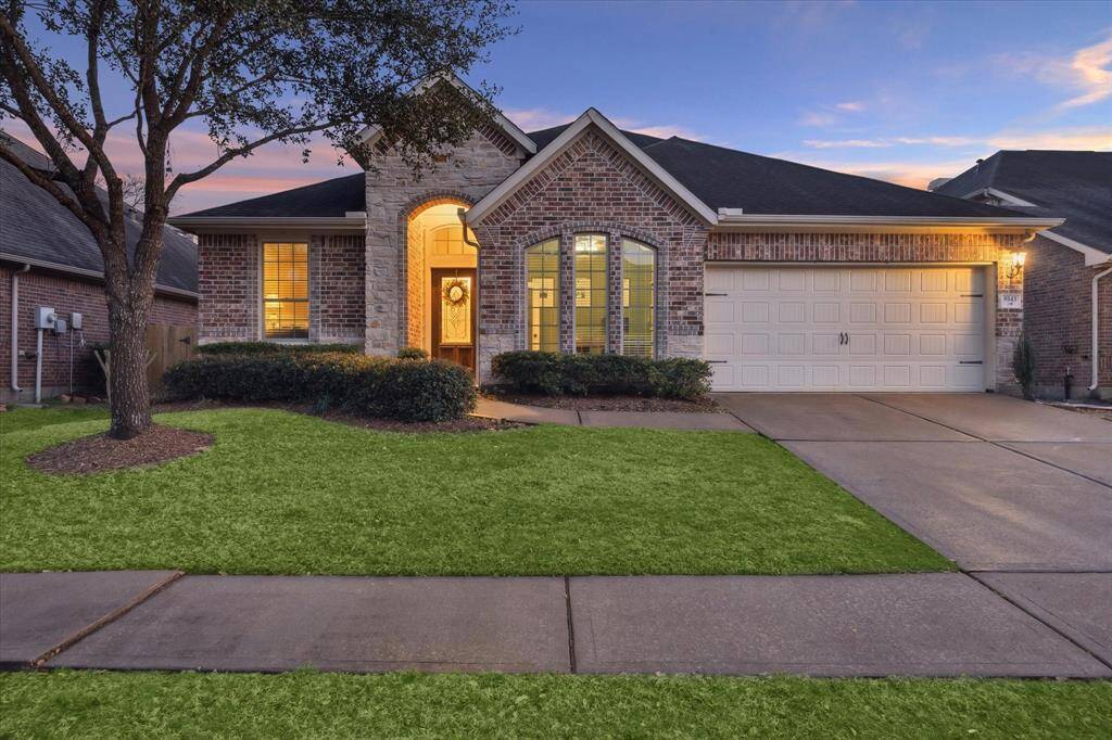 Imagine pulling up to your home and being greeted by the charming, rustic beauty of stone and brick. The textures and colors blend seamlessly, offering a warm and inviting first impression.