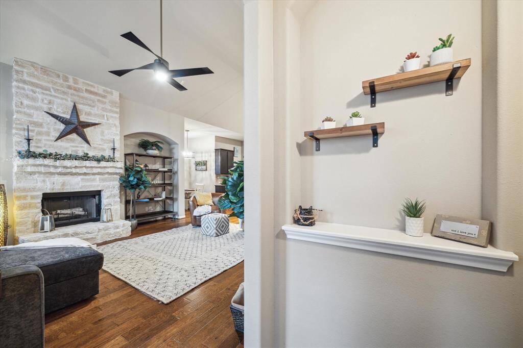 The stone fireplace provides both a classy focal point and a warm gathering place.