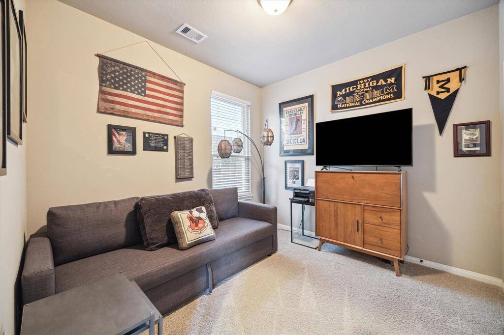 One of 3 additional bedrooms, this room is also an excellent den.