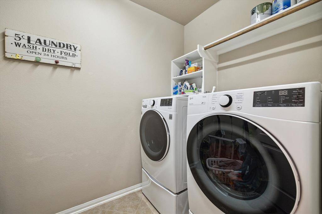 Stay fresh and ready for the day with this large laundry room.