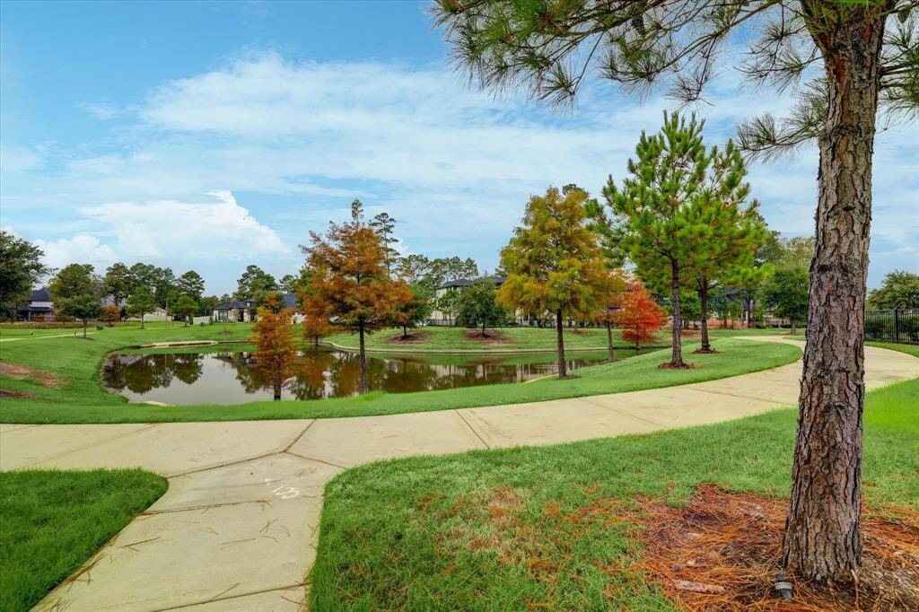 Mature trees, water and plentiful walkways make Harper’s Preserve a suburban oasis.