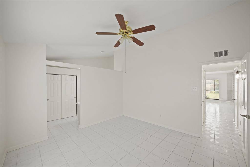 View of primary bedroom. Tons of natural light.