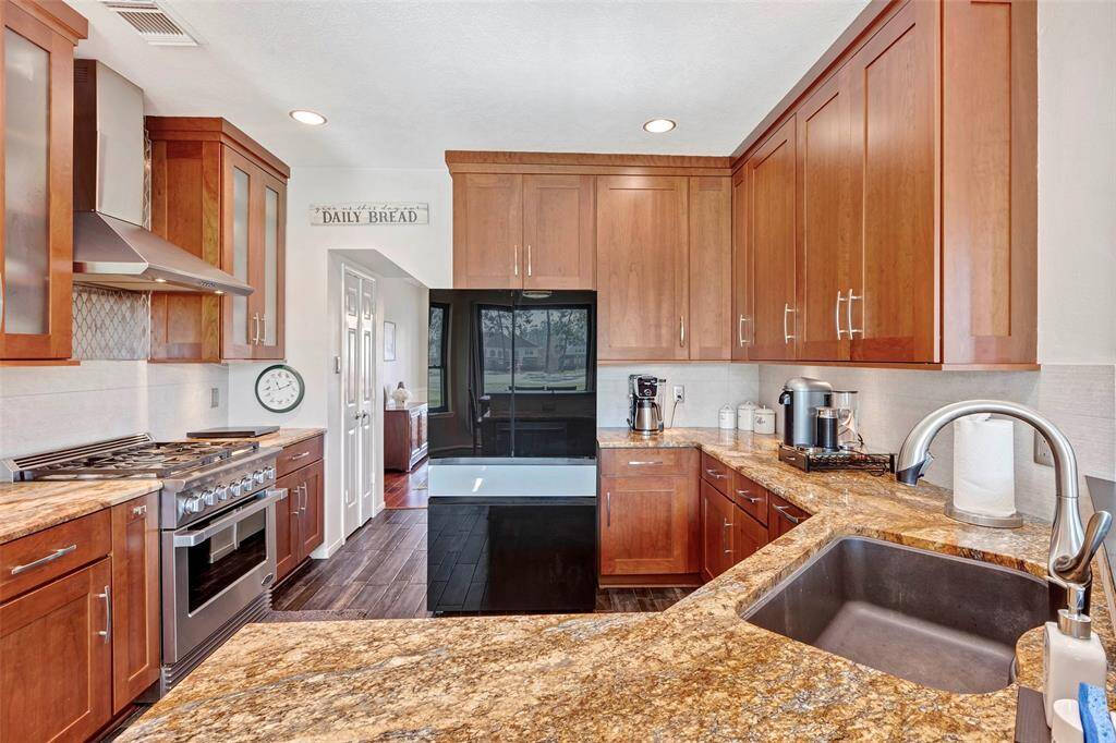 Beautifully remodeled kitchen with modern finishes and top-of-the-line appliances.