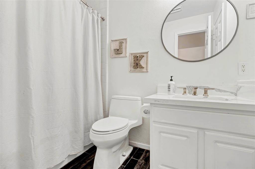 Convenient first-floor full bath for easy access.
