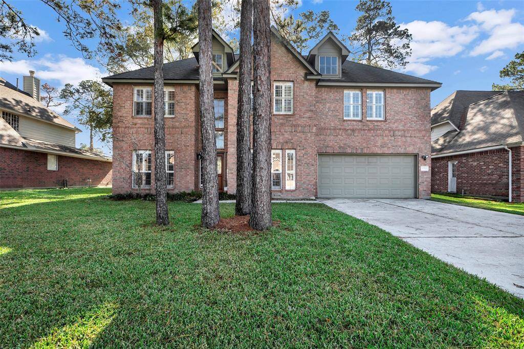 Charming and inviting exterior with lush greenery.
