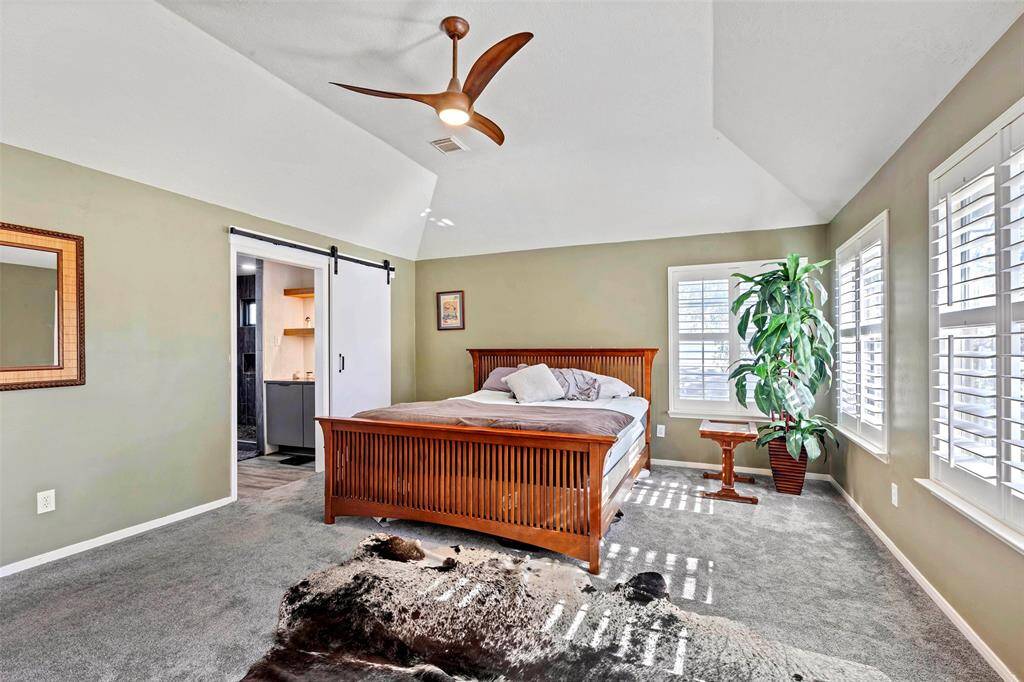 Expansive master suite with abundant natural light and stylish finishes.