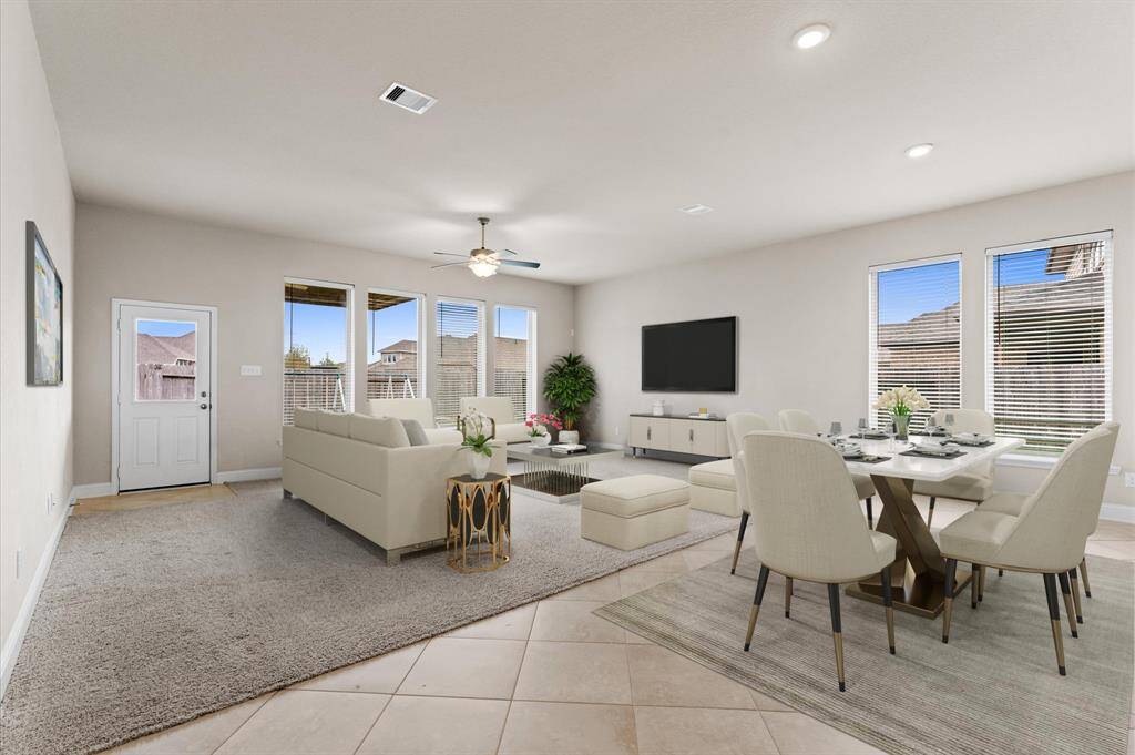 Spacious and filled with natural light, the living area is the perfect spot to gather and relax.