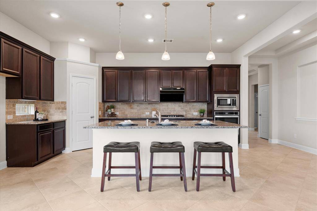 The heart of the home, this kitchen is designed for both style and function.