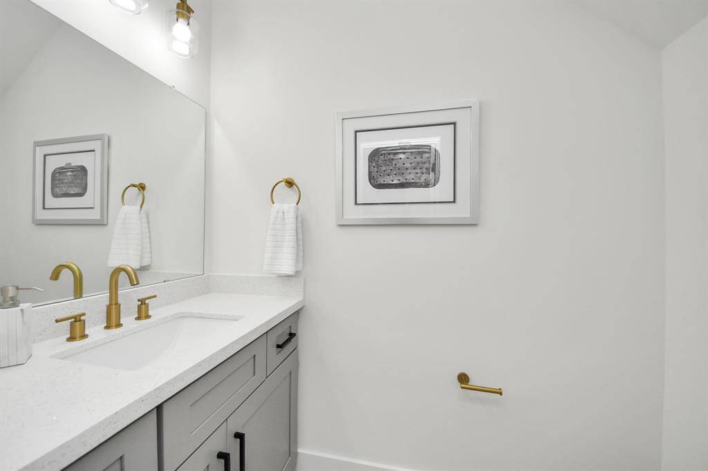 Half bathroom on the first floor - similar floor plan to 8821 Edgar Street