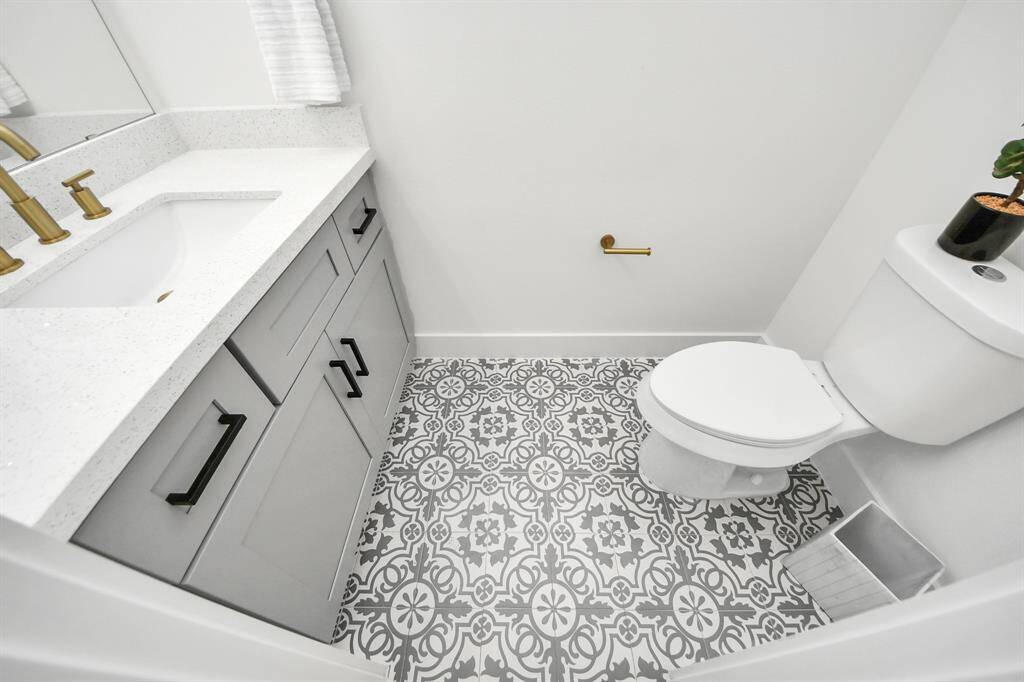 Half bathroom on the first floor - similar floor plan to 8821 Edgar Street