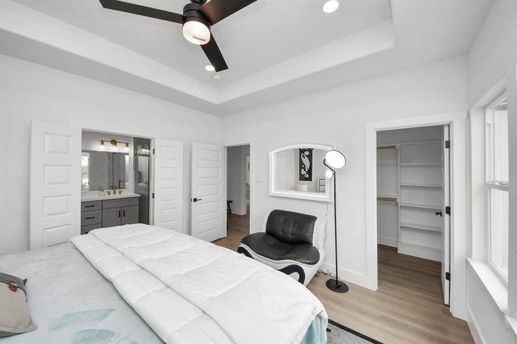 Primary bedroom on the second floor - similar floor plan to 8821 Edgar Street