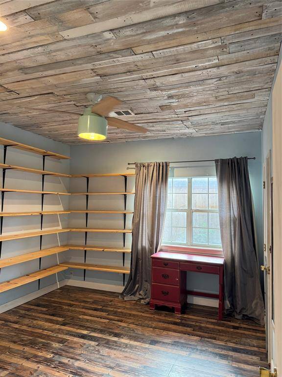 3rd bedroom is being used as an office. Wood ceiling