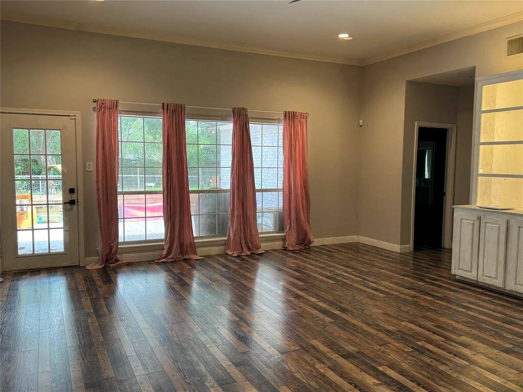 Family room has door leading to covered patio