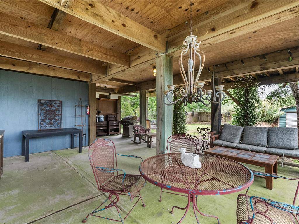 Large covered entertaining area to add games or other items to entertain your guests or vacation rental guests.