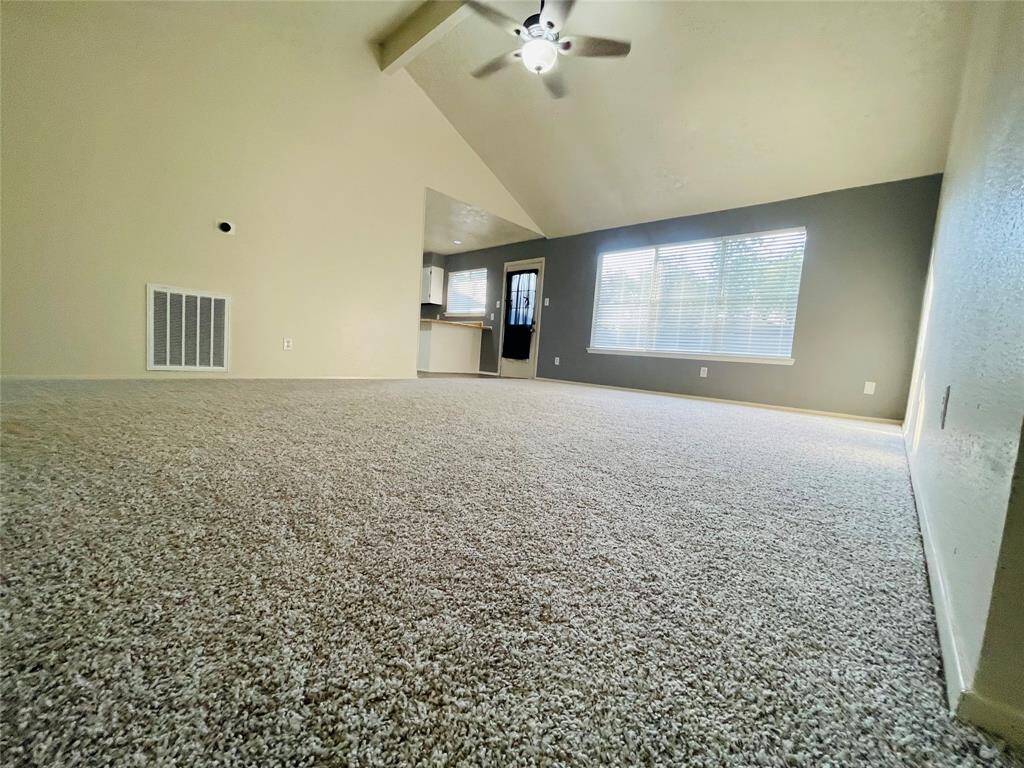 Livingroom with new carpet throughout home