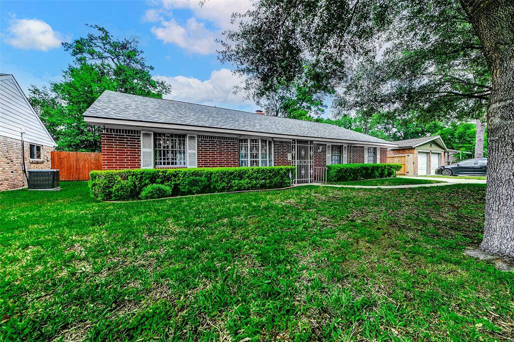 A large, lush front yard leads to this brick charmer, complete with a new HVAC system and durable, recently replaced roof. Set on a generous lot with neighboring homes showcasing pride of ownership, this property is ready for your personal touch.